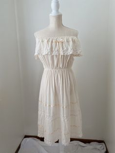 Vintage 80's Cream Gauze Ribbon Off Shoulder Dress- Size Medium/Large Length: 37.5" Midi Length (hits at mid calf) Chest: 20.5" pit to pit laying flat  Waist: 12.5" up to 28" laying flat  -Lightweight semi sheer crochet gauze material. Ribbon accents at bodice and hemline. -Dress is unlined/ semi sheer -Elastic waist, can be worn on or off the shoulder In pristine vintage condition. Material is speckled throughout. Shabby Chic Boho, Ruffle Maxi Skirt, Ribbon Dress, Gauze Dress, Top Skirt Set, Beautiful Skirts, Puff Sleeve Top, Dress Clothes For Women, Night Gown