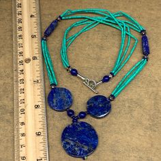 "32.6 grams, 2mm - 30mm, 21\" Multi-strands Beaded Lapis Lazuli Pendant Necklace ATS Statement, oval, round shape, Green Synthetic Turquoise. Ep157 Weight: About 32.6 Grams or so Lapis Beads: About 17mm-30mm Lapis Beads Thickness: About 4-5mm Nephrite Beads Size: 1mm x 2-3mm Length: About 21\" or so The exact item will be delivered. I list one by one. So, purchase with confidence. I do offer combined shipping." Artisan Oval Turquoise Blue Necklace, Artisan Blue Oval Turquoise Necklace, Blue Turquoise Necklace With Round Beads, Artisan Blue Round Beads Gems And Cabochons, Artisan Blue Round Beads, Round Lapis Lazuli Beads For Jewelry Making, Lapis Lazuli Beaded Necklaces For Jewelry Making, Round Lapis Lazuli Beaded Necklaces For Jewelry Making, Blue Oval Beads Gemstone Jewelry