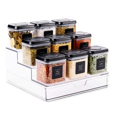 an assortment of spices and seasonings in plastic containers