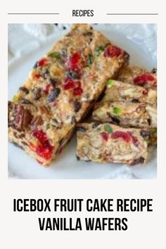 a white plate topped with pieces of fruit cake