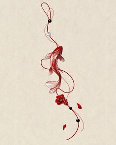 a red fish is hanging from a string on a white background with black beads and flowers