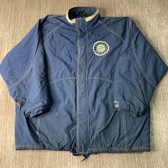 Vintage 2000s Seattle Mariners MLB Baseball Sportswear Athletic Basic Essential Streetwear Navy Zip Up Jacket Extra Large Mens Condition:  Fair Used Condition  = Staining Throughout The Jacket Due To Age And Wear  Measurements: Please see photos above for all measurements IF YOU BUY TWO OR MORE ITEMS USE THE CODE BUNDLE @ CHECK TO SAVE 20% WE SHIP WITHIN 24 HOURS AFTER PURCHASE! Please be aware that we do not offer free returns!! The Buyer is responsible for the cost of the return label.  Follow Sporty Navy Outerwear For Sports Events, 90s Winter Sports Outerwear, 90s Winter Outerwear For Sports Events, Sporty Navy Sport Coat For Streetwear, Sporty Navy Outerwear With Moisture-wicking, Sporty Navy Sport Coat For Casual Wear, Casual Navy Outerwear For Sports, 90s Style Long Sleeve Outerwear For Sports Events, Casual Moisture-wicking Outerwear For Sports Events