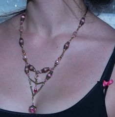 "Hand Made and designed by Yvonne. This beautiful and creative necklace is made with with Glass, Pink Pearls, Filigree Floral End Caps and Pink Glass Heart Beads. The wired and connected chain portions are Vintage/ Antique German made chain sections, and have been tested as gold filled.  As shown, this measures 24 inches long, but as with any of my hand made necklaces, can be made any length you want, just ask.!! This necklace will make the perfect gift for \"your girl\", or lady, on Valentines Beaded Crystal Lariat Necklace For Gifts, Beaded Lariat Crystal Necklace For Gifts, Handmade Lariat Necklace For Parties, Handmade Long Lariat Necklace For Party, Elegant Crystal Necklaces For Festivals, Beaded Lariat Necklace Perfect For Gifts, Unique Wire Wrapped Necklaces For Party, Handmade Beaded Necklaces For Jewelry Making On Valentine's Day, Gold Necklaces With Heart Beads For Festival