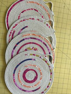 a group of rugs sitting on top of a cutting board