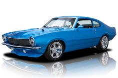 a blue muscle car is shown on a white background with reflective reflection in the foreground