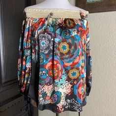 Nwt Never Worn Off The Shoulders Multi Colored Blouse Size Small Perfect For Any Occasion! Material: 96% Polyester 4% Spandex Condition: 10/10 Flowy Multicolor Tops For Fall, Flowy Multicolor Top For Brunch, Chic Multicolor Flowy Top, Fitted Multicolor Top For Brunch, Multicolor Fall Tops For Brunch, Multicolor Tops For Fall Brunch, Multicolor Peasant Top For Vacation In Fall, Multicolor Peasant Top For Fall Vacation, Multicolor Fitted Peasant Top For Summer