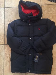 RALPH LAUREN BOYS PUFFER HOODIE JACKET SKI SNOW. COLOR NAVY AND RED. SIZE 7.  NEW WITH TAGS. RETAIL $119 SMOKE FREE AND PET FREE SERIOUS BIDDERS ONLY PLEASE!!!! PLEASE ASK ANY & ALL QUESTIONS BEFORE PLACING BID(S). PLEASE ASK IF IT IS NOT IN THE LISTING DESCRIPTION & IT IS IMPORTANT TO YOU. SALES ARE FINAL!!! SO ASK ANY & ALL QUESTIONS AHEAD OF TIME. I DO NOT ACCEPT RETURNS UNLESS ITEM HAS BEEN GROSSLY MISREPRESENTED. PAYMENT IS DUE 3 DAYS AFTER AUCTION HAS ENDED. NON PAYING BIDDERS WILL BE REPO Winter Puffer Jacket With Drawstring Hood, Nylon Puffer Jacket With Double-lined Hood, Hooded Puffer Jacket For Fall Winter Sports, Winter Puffer Jacket With Double-lined Hood, Long-sleeve Nylon Puffer Jacket With Double-lined Hood, Navy Windproof Long Sleeve Outerwear, Fitted Hooded Puffer Jacket For Streetwear, Sporty Winter Puffer Jacket With Adjustable Hood, Functional Fitted Hooded Puffer Jacket