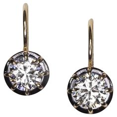 Unveil timeless elegance with our Victorian Style Diamond Drop Earrings, a perfect blend of classic sophistication and modern craftsmanship. These earrings feature a stunning 2.09-carat pair of natural diamonds, exuding a timeless beauty that never fades. Key Features: Exquisite Diamonds: Each earring showcases a brilliant natural diamond, collectively weighing 2.09 carats. Graded H-I for color, these diamonds appear bright white, enhancing their breathtaking sparkle. Clarity and Sparkle: The di Luxury Formal Diamond Earrings With Brilliant Cut, Luxury Diamond Earrings With Brilliant Cut For Formal Events, Luxury Diamond Earrings With Brilliant Cut For Formal Occasions, Luxury Single Cut Diamond Drop Earrings, Luxury Formal Earrings With Single Cut Diamonds, Timeless Formal Earrings With Single Cut Diamonds, Luxury Drop Earrings With Single Cut Diamonds, Luxury Platinum Earrings With Single Cut Diamonds, Formal Luxury Diamond Earrings With Vvs Clarity