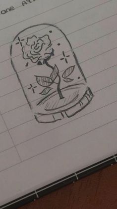 a drawing of a rose in a jar with writing on it