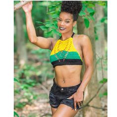 High neck jamaican crop top. 100% acrylic. Trendy High Neck Halter Top For Summer, Summer High Neck Halter Top For Beach, Green Crop Top For Vacation, High Neck Crop Top For Summer, Summer High Neck Crop Top, Green High Neck Top For Summer, High Neck Green Top For Summer, Green High Neck Summer Top, Trendy Cropped Crop Top For Vacation