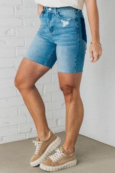 Make a bold statement with the Willow Scissor Cut Bermuda Shorts. Stay stylish, comfortable, and true to your size with the curve-hugging, high-waist fit. The medium wash gives a timeless look, while the pocketless and slimming seam backs take your shorts game to the next level. Cut to impress! 99% Cotton 1% Spandex High Rise Medium Wash Scissor cut Hem Dark faux back pocket detail SIZING: Model is 5'4" wears a size 3/5 and is modeling the small. More info here. Small 2-4 Medium 6-8 Large 10-12 Denim Bottoms With Built-in Shorts Mid-thigh Length, High Rise Dark Wash Bermuda Shorts With Built-in Shorts, Fitted Denim Bermuda Shorts In Medium Wash, Fitted Medium Wash Denim Bermuda Shorts, Stretch Denim Bottoms With Built-in Shorts, Fitted Medium Wash Bermuda Shorts For Summer, High Rise Stretch Jean Shorts In Dark Wash, High Rise Stretch Jean Shorts In Light Wash, Fitted High Rise Denim Bermuda Shorts