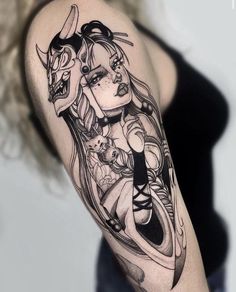 a woman's arm with a black and white tattoo design on her left arm