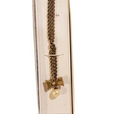 Stella And Dot The Lady Bow Lo Necklace Nwt Elegant Gold Necklace With Decorative Bow, Bow Pearl Necklace, Bow Necklace Gold, Gold Necklaces With Bow Detail, Stella And Dot Necklace, Stella And Dot, Womens Jewelry Necklace, Dots, Cream