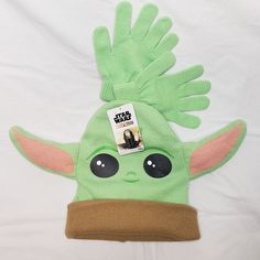 a star wars yoda beanie hat with an ad for the child's movie