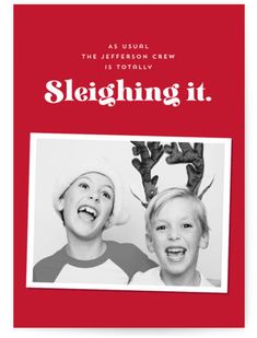 two children with antlers on their heads and the words sleighing it