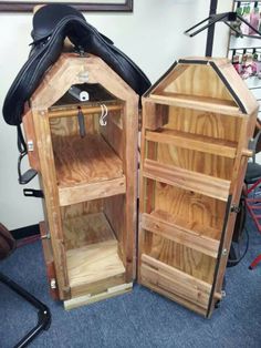 two wooden storage cabinets sitting next to each other