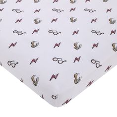 a white sheet with glasses and lightning symbols on it