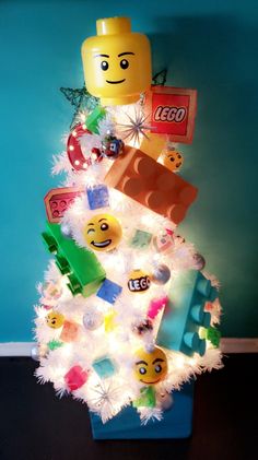 a christmas tree made out of legos and other toys