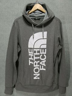 The North Face Men's Hoodie Graphic Big Logo Size Medium Gray   Size: Medium   Actual Measurements:                                   - Armpit to Armpit: 24”                                                   - Neck to Front Hem: 27”   - Back Neck to Bottom Hem: 29”   - Neck Hem to Cuff Hem: 32”   - Shoulder Hem to Cuff Hem: 28“   Color: Gray Features:Bottom of Form ·       Hood with drawstring ·       Front pouch pocket Condition: This hoodie has some minor pilling. Please see pictures for detai Gray Cotton Logo Sweatshirt, Gray Logo Sweatshirt For Streetwear, Gray Long Sleeve Logo Sweatshirt, The North Face Hooded Streetwear Top, The North Face Cotton Hooded Hoodie, The North Face Hooded Hoodie For Streetwear, Hooded The North Face Tops For Streetwear, The North Face Cotton Hooded Sweatshirt, The North Face Streetwear Hoodie With Adjustable Hood