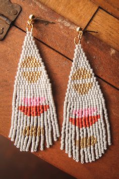 Beaded Handwoven Boho Half Moon Fringe Earrings - Grey - Mango + Main Bohemian White Woven Jewelry, White Bohemian Woven Jewelry, Bohemian Woven Dangle Beaded Earrings, Bohemian Handwoven Beaded Dangle Earrings, Bohemian Handwoven Beaded Drop Earrings, Festival Handwoven Gold Beaded Earrings, Moon Fringe Earrings, Half Moon Design, Handwoven Earrings