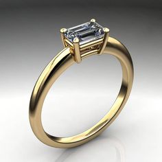 India is a sweet gold ring, with a .5 carat NEO moissanite emerald cut at the center. The stone is set sideways, also called an east west ring. Simple and modern.She has clean lines and in 14k yellow gold, the warm tone of the metal contrasts in a fab fashion with the delicious cool NEO emerald cut center stone. This ring features a near colorless .5 carat emerald cut NEO moissanite at the center. Select 14k white, yellow or rose gold at checkout. Want to see the emerald cut NEO in action? https Classic Emerald Cut Moissanite Sapphire Ring, Classic Gia Certified Emerald Cut Sapphire Ring, Moissanite Emerald Ring For Promise, Emerald Cut, Moissanite Emerald Cut Ring For Promise, Moissanite Emerald Cut Promise Ring, Emerald Cut Moissanite Sapphire Ring With Vvs Clarity, Emerald Cut Solitaire Sapphire Ring, Formal Emerald Cut Moissanite Ring, Fine Jewelry Sapphire Ring With Moissanite In Emerald Cut