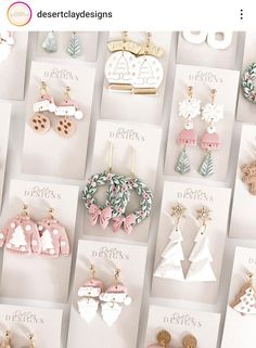 there are many different types of earrings on the display wall in this photo, and one is for sale