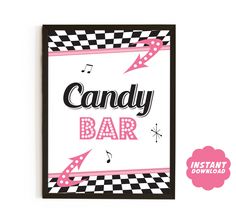 a sign that says candy bar with pink and black checkerboard pattern on it