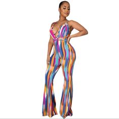 Splash Of Color Jumpsuit This Jumpsuit Has Some Stretch And Is Tall Girl Friendly Very Soft Comfortable Material Multicolor V-neck Party Swimwear, Multicolor Stretch Bodysuit For Beach Party, Stretch Multicolor Bodysuit For Beach Party, Striped Jumpsuits And Rompers For Party, Multicolor Sleeveless Bodysuit For Beach Party, Multicolor Spring Vacation Bodysuit, Multicolor Stretch Jumpsuits And Rompers For Beach, Stretch Multicolor Jumpsuits And Rompers For Beach, Multicolor Stretch V-neck Bodysuit