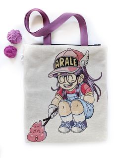 You will love this tote bag. It is your best option for gifting or treating yourself if you are a fan of Arale and Akira Toriyama's Dr. Slump drawings. This tote bag has a large capacity, features a zipper opening at the top, and another pocket inside.  *CUSTOM MADE PRODUCT* 💜 FEATURES: *Canvas tote bag, organic cotton, and tapestry (60% Polyester 40% Cotton) durable and thick *Metal YKK zipper opening *1 zippered pocket (at the top) *1 pocket inside *100% durable cotton straps *Fully lined 👀 Cartoon Character Print Bags For Everyday Use, Harajuku Pouch Bag As Gift, Harajuku Style Pouch Bag For Gift, Harajuku Style Pouch Bag Perfect For Gifts, Harajuku Style Pouch Bag As Gift, Handmade Kawaii Bags For Daily Use, Harajuku Style Tote Bag As Gift, Harajuku Style Tote Bag For Gifts, Kawaii Canvas Tote Bag Perfect As A Gift