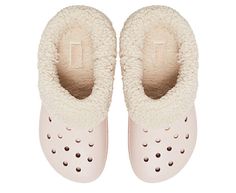 Crocs Classic Blitzen Women's Lined Clog Indoors or out, you'll be cozy in the Classic Blitzen lined Clog from Crocs. Enjoy year-long style with a fuzzy interior that keeps toes nice and warm. Make them yours with Jibbitz™ charms to show off your personality. Synthetic upper Slip-On Customizable w/ Jibbitz Removable/plush liner Dual Crocs Comfort Winter Cozy Clogs With Cushioned Footbed, Cozy Winter Clogs With Cushioned Footbed, Synthetic Clogs For Indoor Use In Winter, Indoor Winter Clogs Made Of Synthetic Material, Indoor Synthetic Clogs For Winter, Cozy Winter Slip-on Clogs, Cozy Indoor Winter Clogs, Cozy Winter Indoor Clogs, Casual Synthetic Clogs For Winter