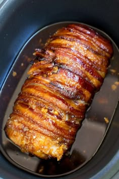 the meat is cooked in the crock pot and ready to be put into the slow cooker