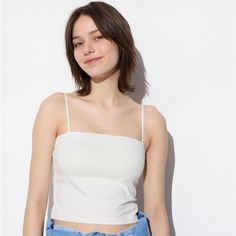 This Is A White Nwt Uniqlo Airism Tube Tank Top With Built-In Bra. Perfect For Any Weather, Travel, Or Layering. Packaged And Shipped From A No-Pet And No-Smoking Home. Basic White Camisole For Spring, White Basic Camisole For Spring, White Basic Tank Top For Day Out, Basic White Tank Top For Day Out, Casual Solid Color Tops By Uniqlo, White Camisole Crop Top For Day Out, White Camisole Crop Top For Spring, Trendy White Crop Top Camisole, Basic Camisole Tops For Spring