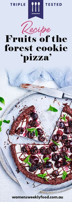 a piece of fruit and chocolate pizza on a plate with the words recipe fruits of the forest cookie pizza