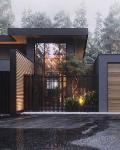 an image of a modern house in the middle of the street with garage doors open