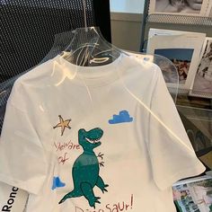 Olivia Mark - Cotton Fun Cartoon Print Short Sleeve T-Shirt with Stylish Loose Fit Dinosaur Shirt, Cartoon Dinosaur, Linen Short, Pullover Shirt, Cool Cartoons, Dinosaur Print, Cartoon Print, Clothing Patterns, Workout Shorts