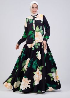 Elevate your wardrobe with this stunning floral print button-front maxi dress, crafted from durable crepe fabric for long-lasting comfort and elegance. The soft black base is adorned with a vibrant floral pattern, making it a standout piece for any occasion. Designed with a modest fit, this dress features a belted waist and tiered skirt, providing a flattering silhouette that flows gracefully with every movement. The button-front design adds a touch of sophistication, while the long sleeves ensu Button Front Maxi Dress, Modest Fits, Abaya Dress, Button Front Dress, Floral Print Maxi Dress, Floral Print Maxi, Dress Satin, Button Dress, Crepe Fabric