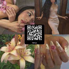 a woman with long nails and flowers on her finger next to a fake flower in front of a mirror