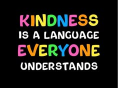 the words kindness is a language everyone understands in multicolored letters on a black background