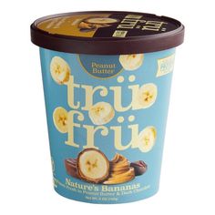 an ice cream container filled with fruit and nuts