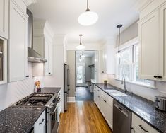 the kitchen is clean and ready for us to use it's granite counter tops