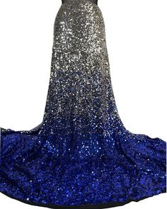 Exclusive Stretch Sequin Fabric/Royal Blue And Silver Sequin/Ombre Stretch Sequin /2 tone Stretch Sequin- royal blue & silver- Per Yard. it is idea for Prom Dresses, Costumes Dresses, Evening Grown, Bridal Dresses or may use for any special project.   Sequins: 100% polyester sequins Mesh: 92% Polyester & 8% spandex; 4 Way Stretch Mesh Color:  Stretch Black Mesh- Gold and Silver 5mm Sequins.  Width: 54" Sold By: By Yard Care Instruction: Hand wash in cold water, mild detergent and line dry. No bleach, iron or dry clean. Testing for chlorine/sweat sensitivity prior to garment production is recommended. Shipping:  1)  If you place Order before 5 pm we ship your order same day and take 1-3 Days to deliver by USPS Priority Mail or FedEx. 2) If you Need Overnight Shipping Quite please contact wi Grown Dress, Silver Ombre, Sequins Fabric, Crystal Dress, Ombre Design, Yard Care, Arctic Blue, Sequin Fabric, Silver Sequin