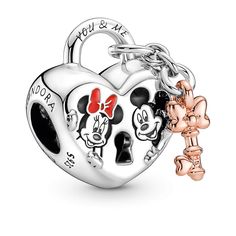 This Disney Mickey Mouse & Minnie Mouse Padlock Charm is a celebration of everlasting love, featuring one of the world's most beloved couples. The adorable dangle charm is hand-finished in sterling silver, in the shape of a padlock, decorated with Disney's Mickey and Minnie Mouse and completed with a 14K gold-plated key. An engraving of "You & Me" is written across the top of the lock, making this Disney x Pandora charm a special jewelry gift for a loved one, or to yourself, to show how Charms Disney, New Pandora Charms, Charm Necklace Diy, Pandora Charms Disney, Disney Charms, Charms Pandora, Mickey Mouse Minnie Mouse, Pandora Disney, Mickey Y Minnie