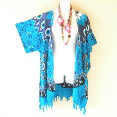 I Do Not Accept Offer Price Due To Low Markup. For Multiple Purchases , Text Me Via Each Posting So That I Can Create A Bundle Posting For You To Save Shipping Cost. Most Of My Clothing Are One Of The Kind So Please Check For Availability Before Buying. Bundle Up In Style With This Cute Open Front Cardigan Duster Blouse Wrap In Kimono Sleeves. Design To Bring Comfort To Drape Beautifully To Wide Range Of Body Shapes And Sizes. With Luxuriously Rayon Textured, This Open Front Cardigan Is A Must H Blue Long Cotton Outerwear, Long Blue Cotton Outerwear, Casual Blue Cotton Kimono, Bohemian Open Front Cotton Outerwear, Blue Casual Kimono For Winter, Casual Blue Kimono For Winter, One Size V-neck Beach Outerwear, Blue Casual Winter Kimono, Light Blue Cotton Summer Outerwear