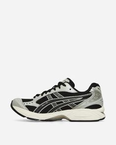 Asics GEL-Kayano 14 Sneakers Black / Seal Grey.As a nod to the storied Asics GEL-KAYANO™ series, the GEL-KAYANO™ 14 running shoe returns with a late-2000s aesthetic. The first iteration in the sneaker's lineage to be designed by someone other than Toshikazu Kayano, this version reinterprets the shoe's performance capabilities with updated materials and components. The original midsole tooling with GEL™ technology cushioning is mirrored here. The fit of the upper is also improved, while the layered leather and mesh construction from 2008 is retained..Synthetic Upper.Leather Overlays.GEL™ Technology Cushioning.Rubber Outsole.Style Code: 1201A019-005 Asics Running Shoes With Vented Sides, Asics Lace-up Running Shoes With Vented Sides, Asics Running Shoes With Vented Sides For Streetwear, Asics Sporty Running Shoes With Vented Sides, Sporty Asics Running Shoes With Vented Sides, Asics Running Shoes With Vented Sides For Light Sports, Asics Running Shoes Medium Fit For Streetwear, Asics Running Shoes With Gel Cushioning For Streetwear, Black Sneakers With Vented Sides For Errands