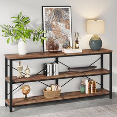 a shelf with books, vases and other items on it in a living room