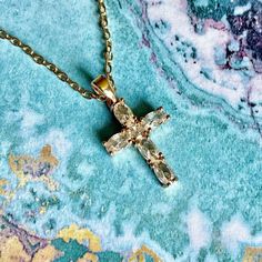 Brilliant Gold Tone Cross  Pendant Necklace  Sparkling White Jewel Rhinestone Cross  Gold Plated 18 Inch Chain  Lobster Clasp Closure Christian or Catholic Cross Comes in Gift Box and Organza Gift Bag Ships within 3 days. Will ship first class mail.  See our shop Hello Emiko for more beautiful handmade jewelry and gifts. Crystal Cross Chain Jewelry, Crystal Cross Jewelry With Adjustable Chain, Crystal Cross Jewelry With Chain, Crystal Cross Necklace With Adjustable Chain, Gold Crystal Rhinestone Cross Pendant Necklace, Elegant Crystal Cross Rhinestone Necklace, Elegant Crystal Rhinestone Cross Necklace, Gold Cross Pendant Jewelry For Party, Crystal Cross Pendant With Rhinestones