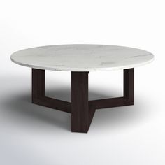 a white marble table sitting on top of a wooden base with two black legs and an oval shape