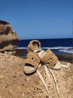 Macrame sandals made with GRS and OEKO-TEK certified recycled cotton. Casual Braided Sandals In Natural Color, Summer Natural Espadrilles For Beach Season, Natural Color Summer Espadrilles For Beach Season, Beige Textile Sandals With Woven Sole, Beige Sandals With Woven Sole, Casual Beige Braided Sandals, Natural Fabric Espadrilles For Vacation, Natural Espadrilles For Beach Season, Beige Jute Sandals For Beach