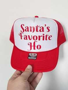 santa's favorite ho trucker hat in red and white with the words santa's favorite ho on it