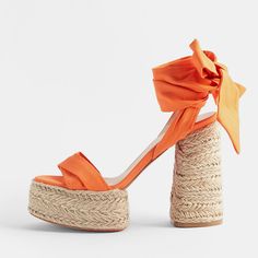 Elevate your summer style with these vibrant Orange Tie-Up Sandals. Featuring an open-toe design, an espadrille platform chunky heel, and chic tie-up detailing, these sandals are both trendy and comfortable. Color: Orange Heel Type: Chunky heel Heel height: 5.5" / 140 mm approx Product measurements were taken using size 8. Please note that measurements may vary by size. Toe: Open toe With platform Lace-up design Handcrafted US sizing. Fits true to size. Pink And Orange Heels, Dreams List, Ribbon Heels, Grad Pic, Cowboy Shoes, Orange Sandals, Orange Wedges, Tie Up Sandals, Orange Heels